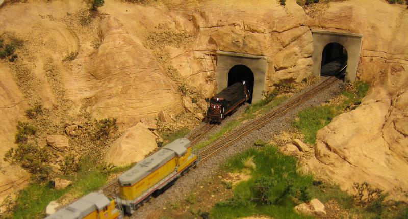 D&RGW exits tunnel #5 while the UP heads west into tunnel #4