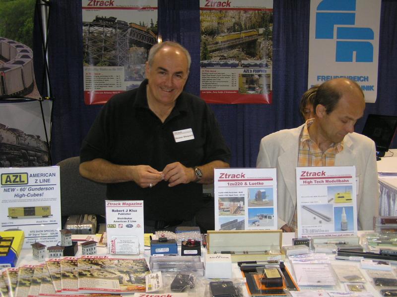 Deane Shepardand Harold manning the booth